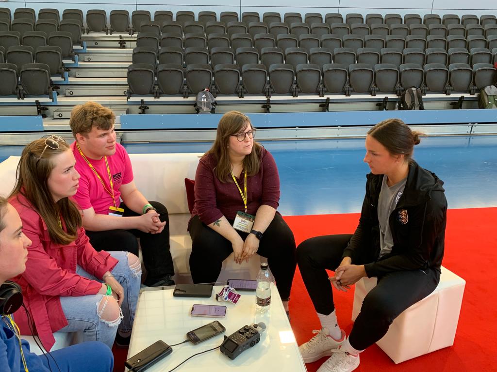 Lotte Wubben-Moy being interviewed by the written press, including students Alfie Dickin and Megan Garbutt (wearing pink). ©Peter Lansley
